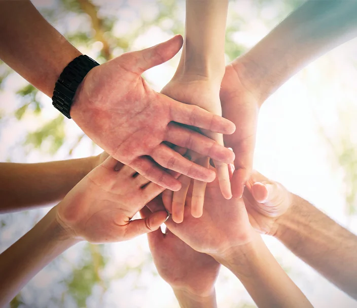 Get Involved - group of hands together