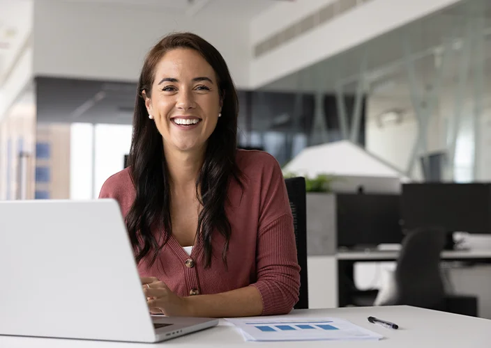 Happy lady using laptop