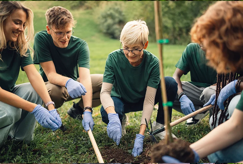 Group of people gardening together