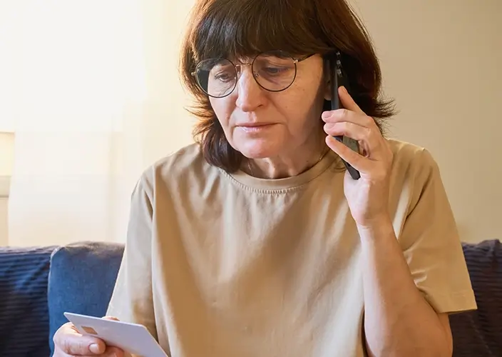 distressed lady calling crisis line